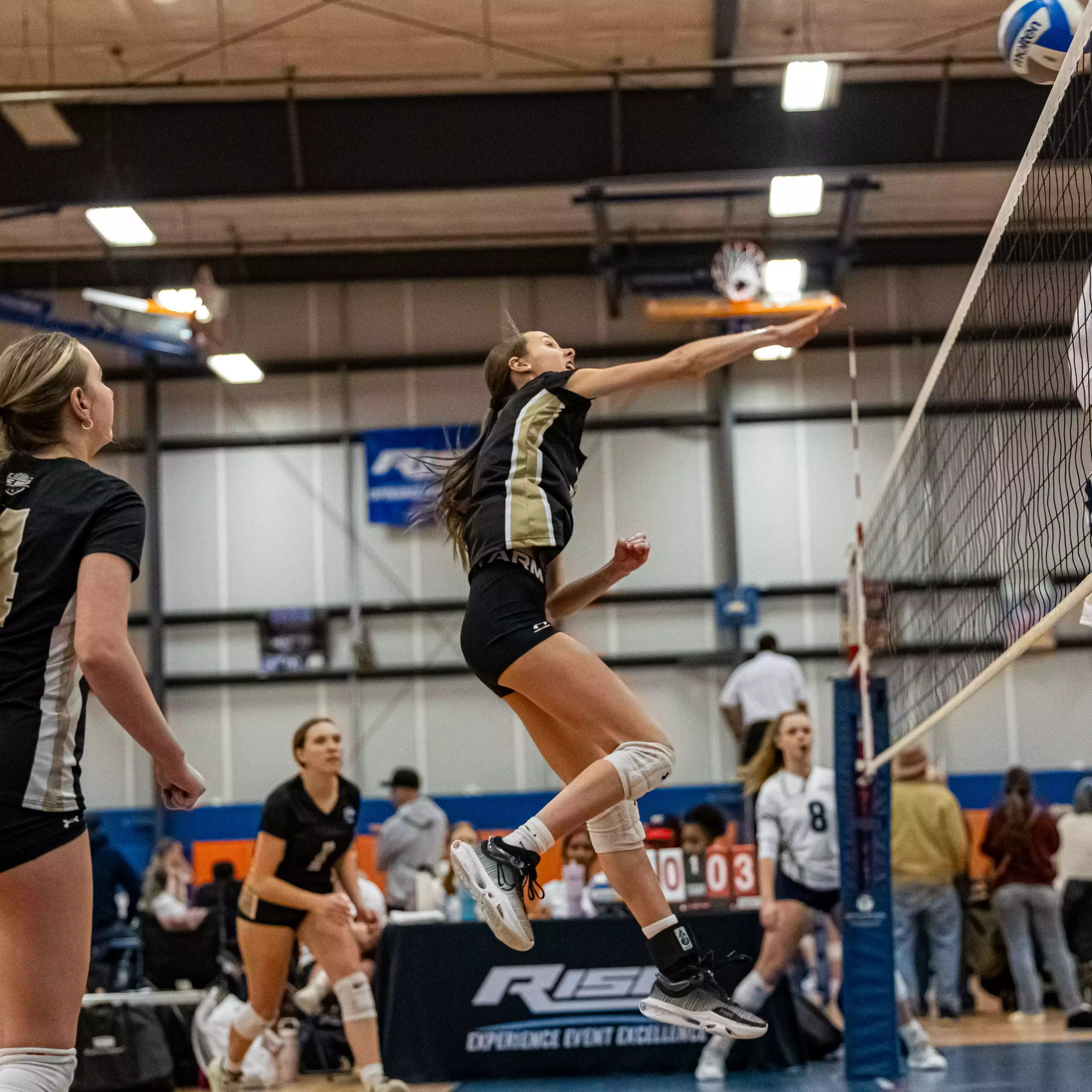 player-spiking-at-net